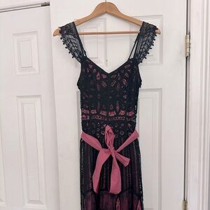 Vintage Betsy Johnson dress size 2. Side zip with hook & eye closure.